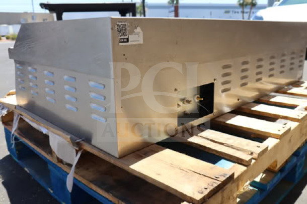 Avantco EG48N 48" electric countertop griddle on a pallet, featuring vented sides and a side control panel, in good condition.