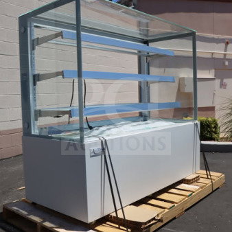 Avantco BCFD-60 white dry bakery display case with LED lighting, broken glass sections, on wooden pallet.