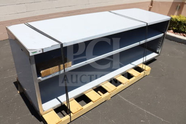 BRAND NEW Regency 30" x 96" stainless steel table, model 600EBT3096D, with sliding doors, midshelf, minor blemishes, unboxed.