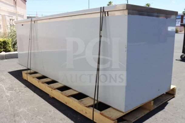 Regency 30"x96" stainless steel enclosed base table, scratch-n-dent, with sliding doors on pallet. Model 600EBT3096D.
