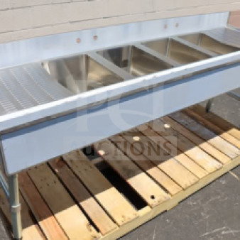 Advance Tabco SLB-64C 72"x18" four-compartment bar sink, two 12" drainboards, steel construction, scratch-n-dent condition.