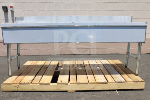 "Advance Tabco SLB-64C bar sink, 72x18 inches, four compartments, two 12" drainboards, new scratch-and-dent condition."