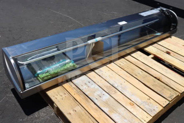 Brand new Hoshizaki HNC-210BA-R-SLH sushi display case, 83", right side compressor, 115V, serial P000839K, on pallet.