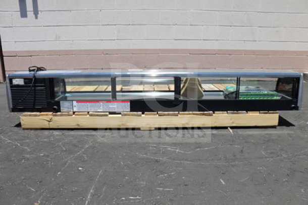Brand new Hoshizaki HNC-210BA-R-SLH refrigerated sushi display case, 83", curved glass, right-side compressor. Serial No: P000839K.