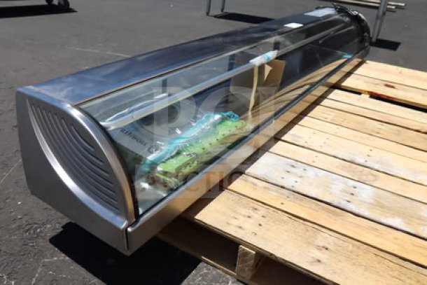 Brand new Hoshizaki HNC-210BA-R-SLH 83" curved glass refrigerated sushi display case, right side compressor, 115V, serial P000839K.