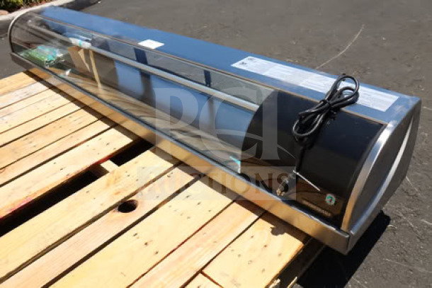 Brand new Hoshizaki HNC-210BA-R-SLH 83" curved glass sushi display case, right side compressor, serial P000839K, unpackaged.