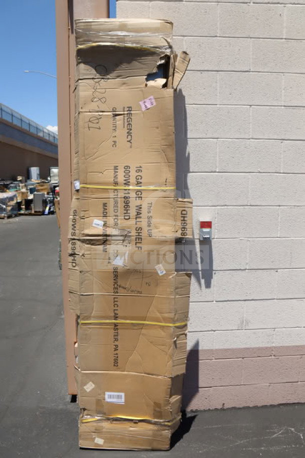 BRAND NEW SCRATCH-N-DENT Regency 600WS1896HD 16 Gauge Stainless Steel 18" x 96" Heavy Duty Wall Shelf in damaged packaging.