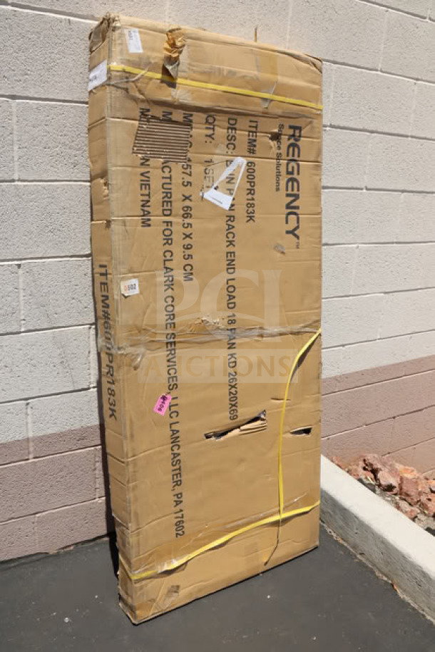 BRAND NEW Regency 600PR183K 18 Pan End Load Bun Rack, unassembled in original packaging, box shows wear and tear.