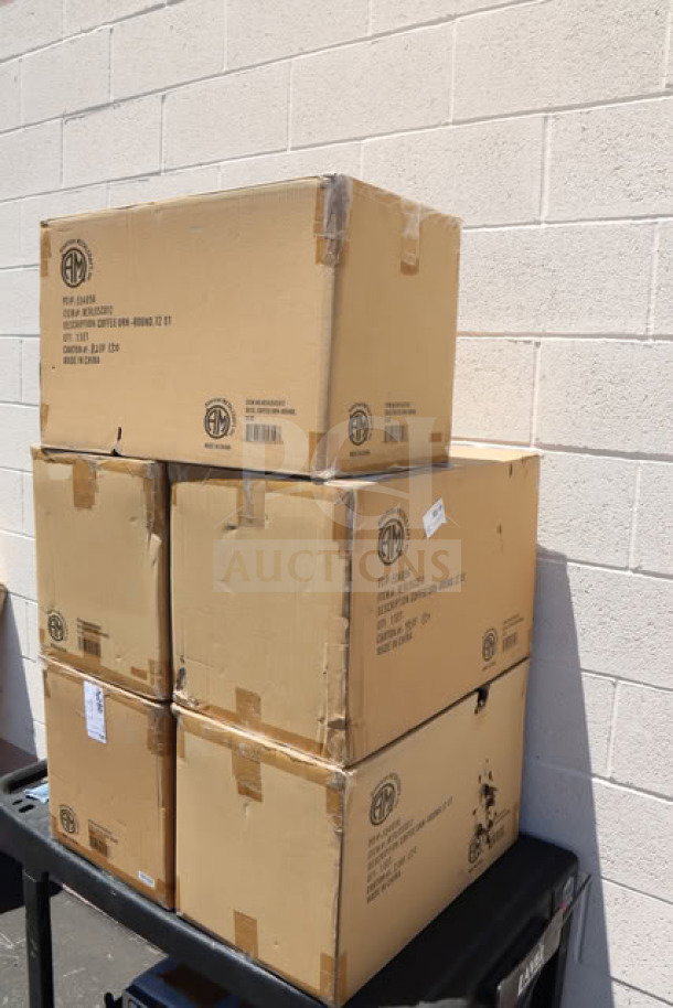 Five unopened boxes of American Metalcraft REVLOSCU12 Evolution 12 Qt. stainless steel coffee urns on a cart.