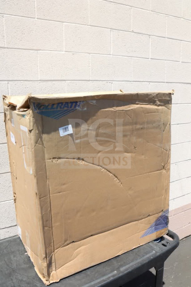 New Vollrath 97181 3 Shelf Bussing Cart in original box. Box shows wear. Cart dimensions: 31" x 18" x 34".