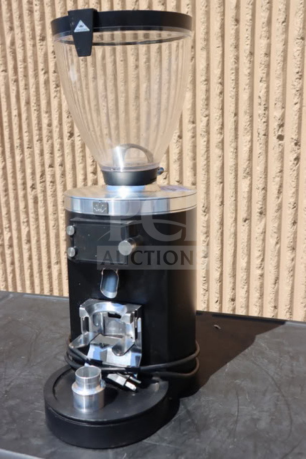Mahlkonig E80W GBS espresso grinder, 4 lb. capacity, black, new scratch-n-dent, model label and power cord visible.