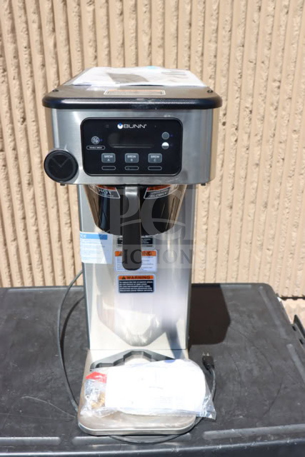 Bunn 53100.0001 BrewWISE ICB-DV stainless steel coffee brewer, dual voltage, minor scratches, model label visible.