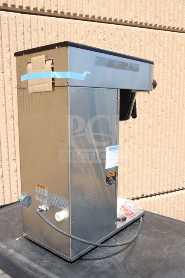Bunn 53100.0001 BrewWISE ICB-DV coffee brewer, stainless steel, dual voltage, minor wear, tags visible.