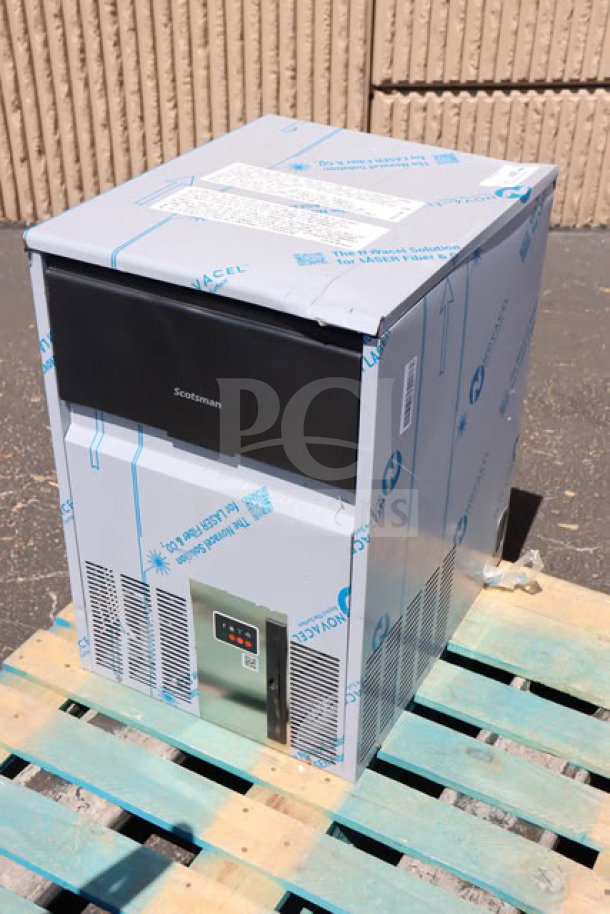 Scotsman UC0918GAX-1A ice machine, new, unboxed, minor scratches. Generates 95 lb. gourmet cubes. Serial #25051330010045.