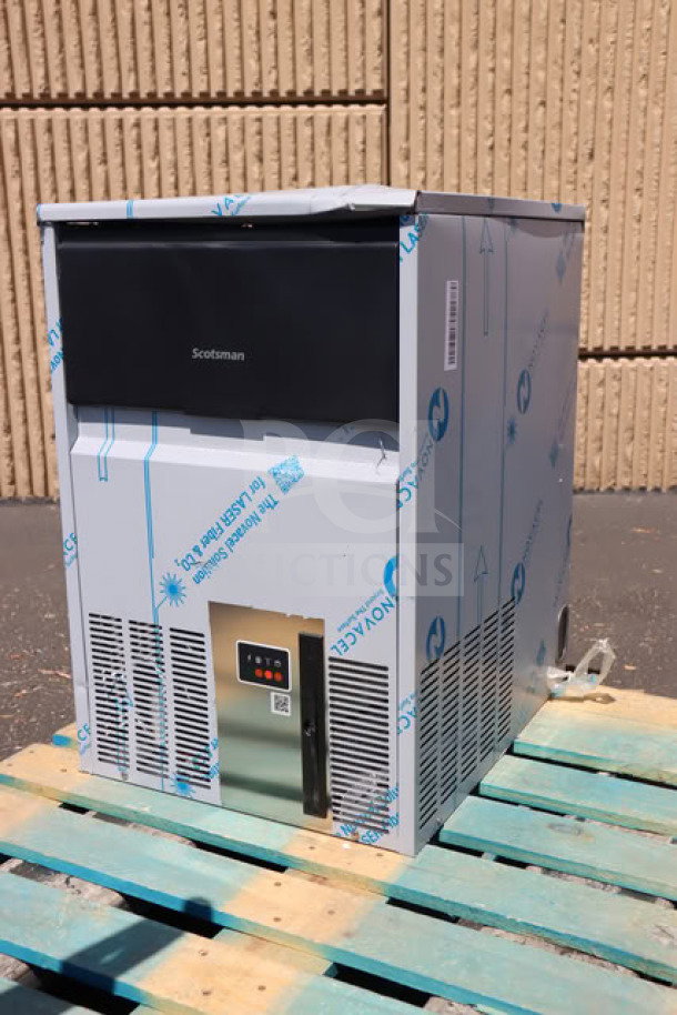 BRAND NEW Scotsman UC0918GAX-1A 18" air-cooled ice machine, 95 lb capacity, unboxed, minor scratches, on wooden pallet.