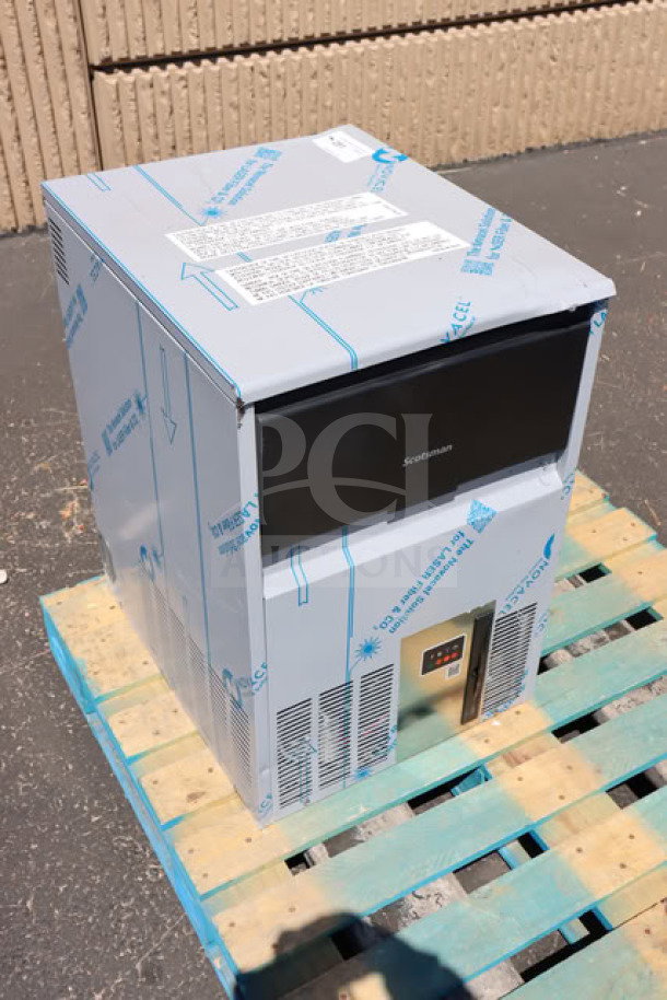 Brand new Scotsman UC0918GAX-1A ice machine, 18" air-cooled, 95 lb capacity, minor scratches, unboxed, serial #25051330010045.