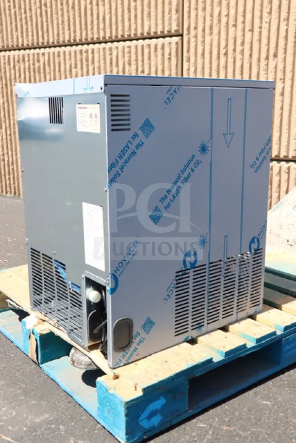 Scotsman UC0918GAX-1A 18" air-cooled undercounter ice machine, 95 lb capacity, minor scratches, unboxed, metal casing.
