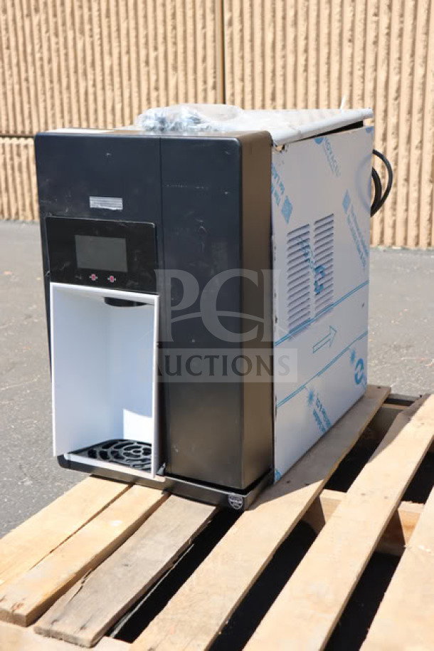 Brand new Follett 15CI114A-IW-CL-ST-00 Chewblet ice maker and water dispenser. Countertop model with 15 lb. bin, air-cooled, 115V, 100 lb. capacity. Visible protective wrap and pallet.