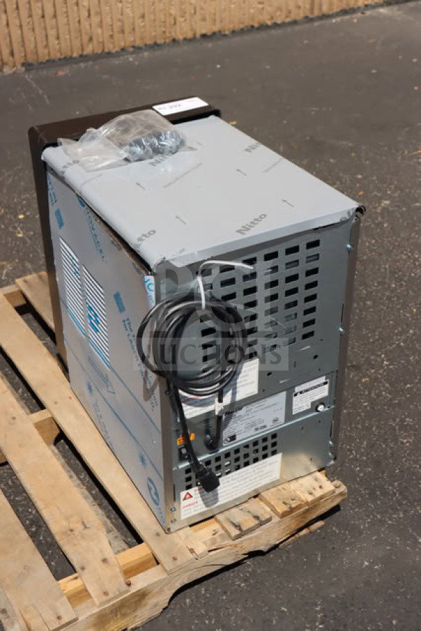 BRAND NEW Follett 15CI114A-IW-CL-ST-00 ice maker on pallet, scratch-n-dent condition. Includes 15 lb. bin and filter.