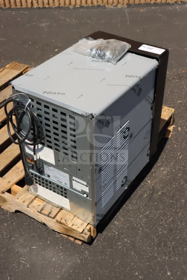 BRAND NEW Follett 15CI114A-IW-CL-ST-00 ice maker and water dispenser, 15 lb. bin, air-cooled, on pallet, minor scratches.