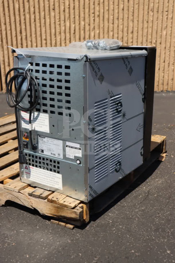 BRAND NEW Follett 15CI114A-IW-CL-ST-00 ice maker and dispenser, air-cooled, on pallet, tags display model and specs.