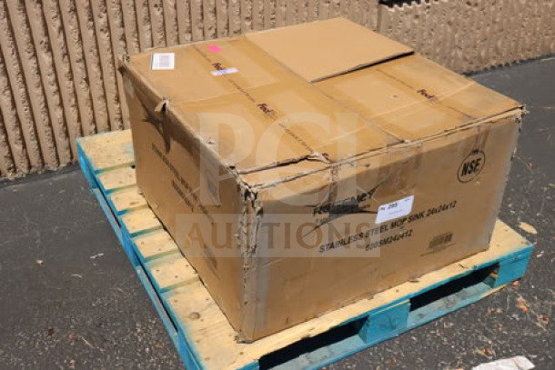 Regency 600SM242412 stainless steel mop sink in damaged box. Model details marked on packaging. 24"x24"x12" bowl size.