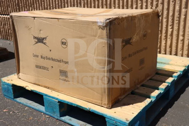 Sealed box of Regency 600SM202812C, 16-gauge stainless steel one-compartment corner mop sink, visible marks on packaging.