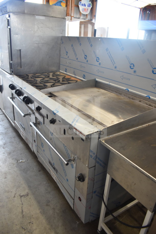 Vulcan 72SS-6B36GTN commercial range with 6 burners, flat top griddle, 2 ovens, and backsplash, shown in stainless steel.