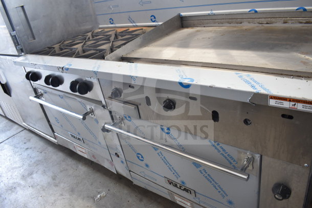 Vulcan 72SS-6B36GTN commercial range with 6 burners, flat top griddle, 2 ovens, and backsplash; shown with protective film.
