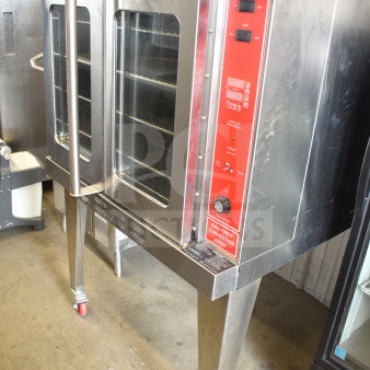 Migali commercial gas convection oven, full size, view-through doors, metal legs, commercial casters, red control panel.