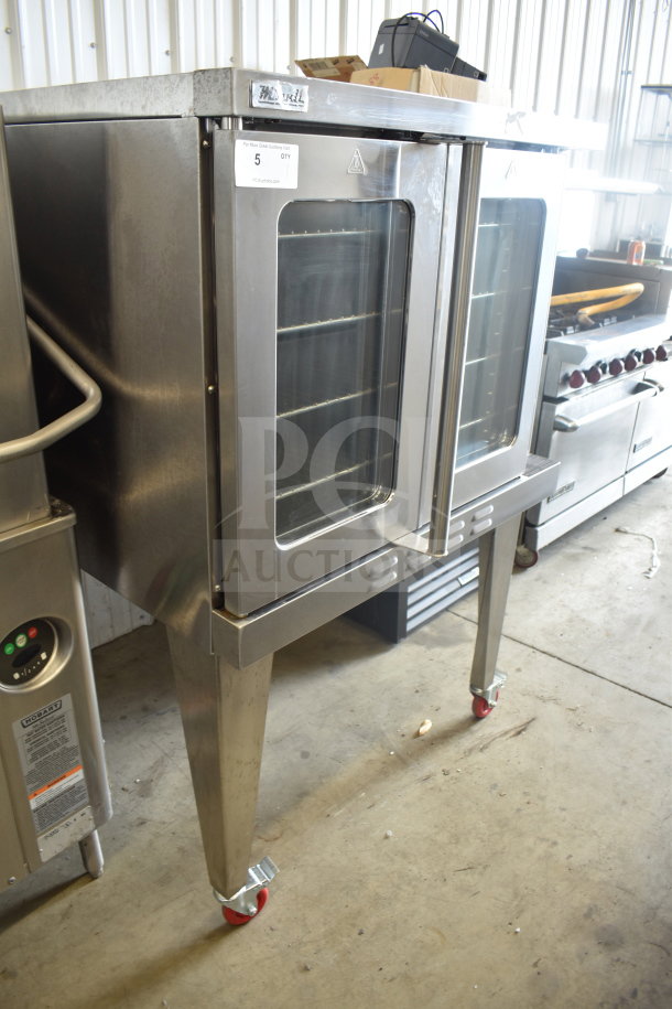 Migali commercial gas convection oven with view-through doors, metal legs, commercial casters. Model in good condition.