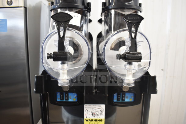 BRAND NEW Carnival King Aurora 2 382SMM2 double 1.6-gallon granita machine. Scratch and dent, 120 volts, 1 phase.