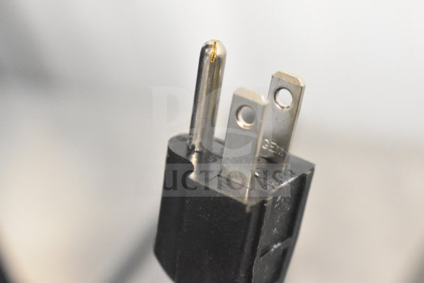Close-up of the power plug from a Carnival King Aurora 2 Pourover Frozen Beverage Machine. 120V, 1 Phase.