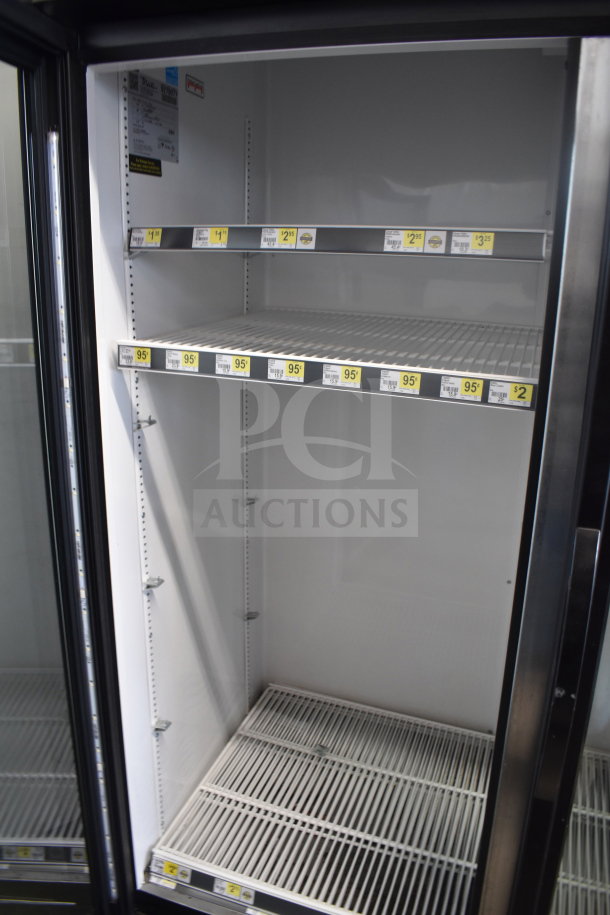 2017 True GDM-72-HC commercial 3-door cooler, 115V, 1 phase. Clean, tested, working with white wire shelves.