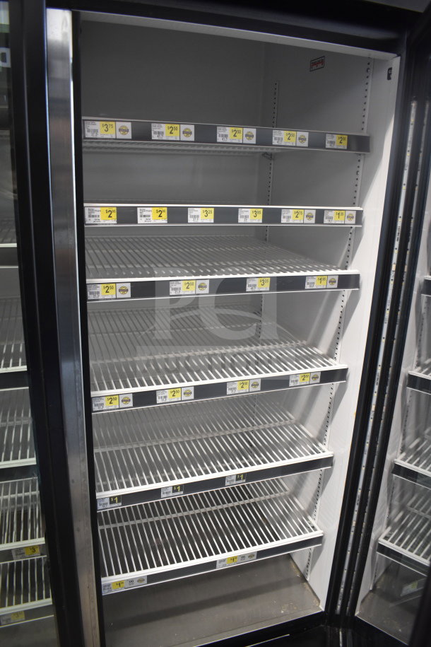 2017 True GDM-72-HC 3-Door Reach-In Cooler Merchandiser, 115V, tested and working, commercial grade, price labels visible.