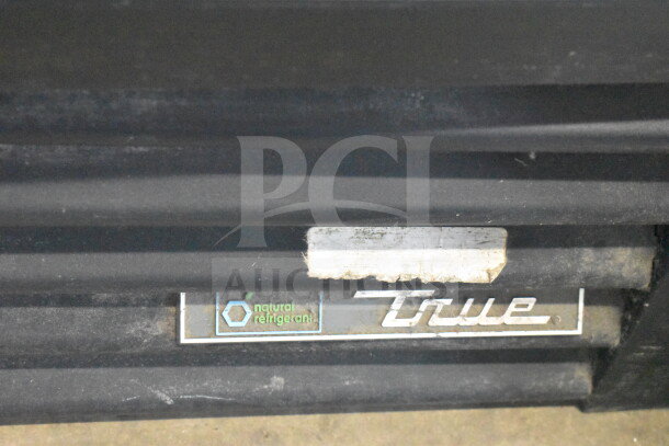 2017 True GDM-72F-HC 3-door reach-in freezer; tested, working. Labels indicate natural refrigerant use.