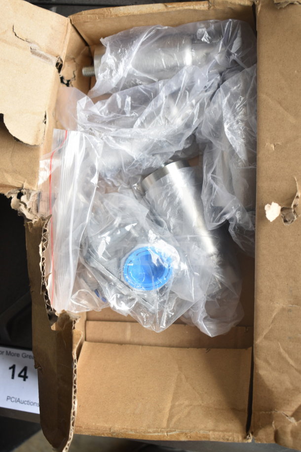 Open box containing sealed components for a Cooking Performance Group 351RCPG12NL countertop range.