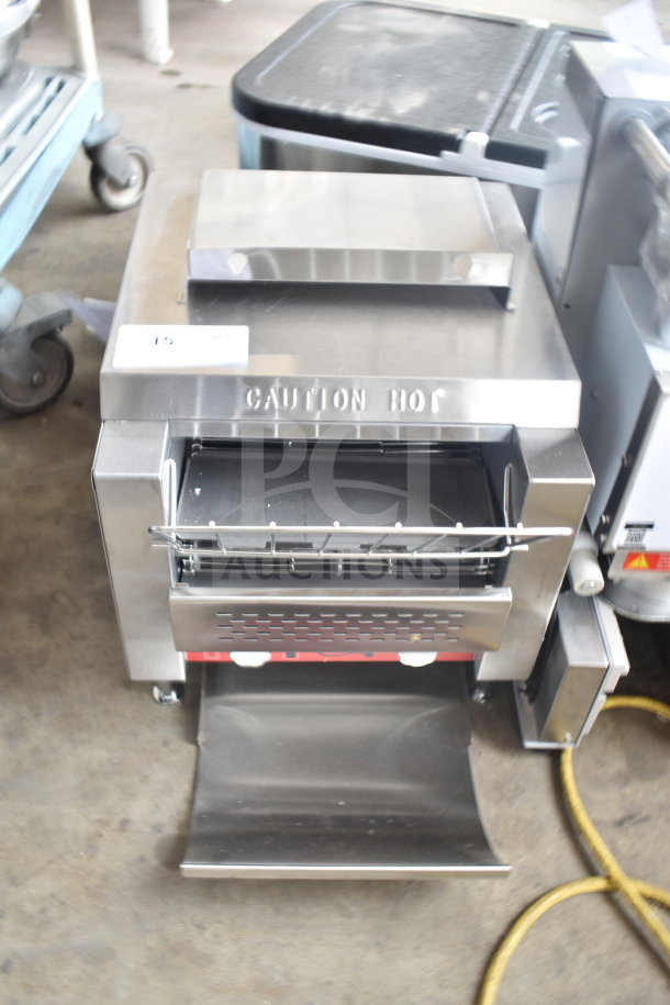 Brand new Avantco 184T140 Conveyor Toaster, scratches and dents visible, 300 slices/hr, 120V, "Caution Hot" marking.