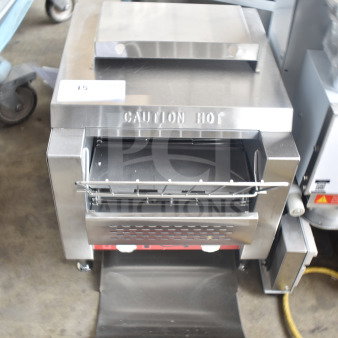 Brand new Avantco 184T140 Conveyor Toaster, scratches and dents visible, 300 slices/hr, 120V, "Caution Hot" marking.