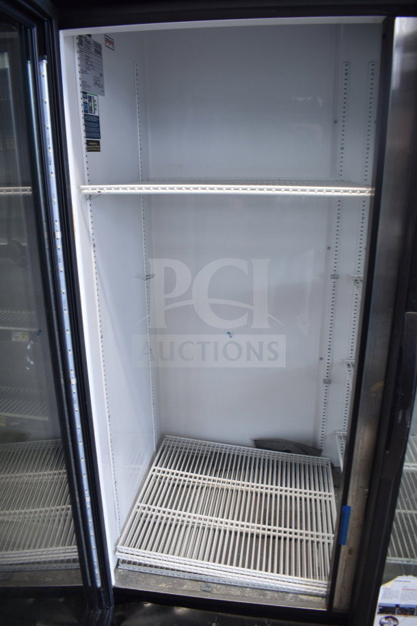 2019 True GDM-72-HC 3 Door Reach In Cooler Merchandiser, 115V, 1 Phase, tested, working, white interior, wire shelves.