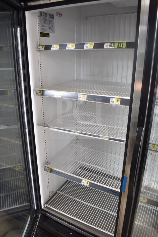 2017 True GDM-72F-HC Commercial 3-Door Reach-In Freezer Merchandiser, 115/208-230V, 1 Phase, tested, working, shelves visible.