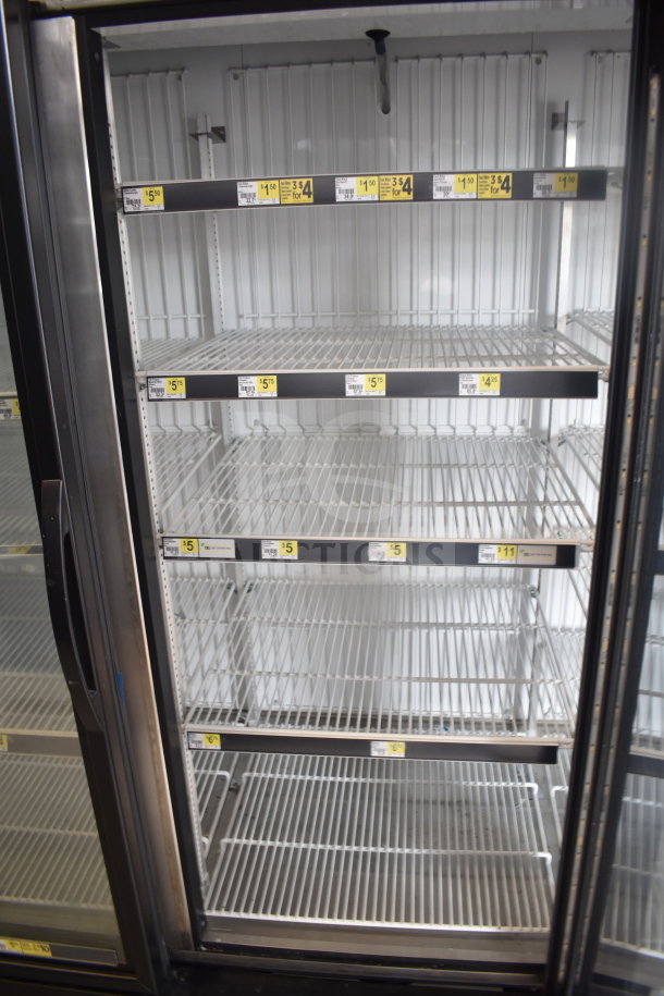 2017 True GDM-72F-HC Commercial 3 Door Reach-In Freezer Merchandiser with metal shelves, clean interior, tested and working.