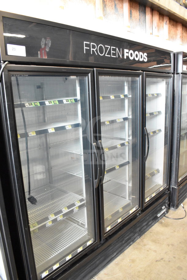 2017 True GDM-72F-HC 3 Door Reach-In Freezer Merchandiser, tested and working, glass doors, labeled "Frozen Foods".