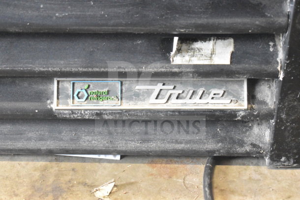 2017 True GDM-72F-HC three-door freezer merchandiser, used, tested working, natural refrigerant label visible.