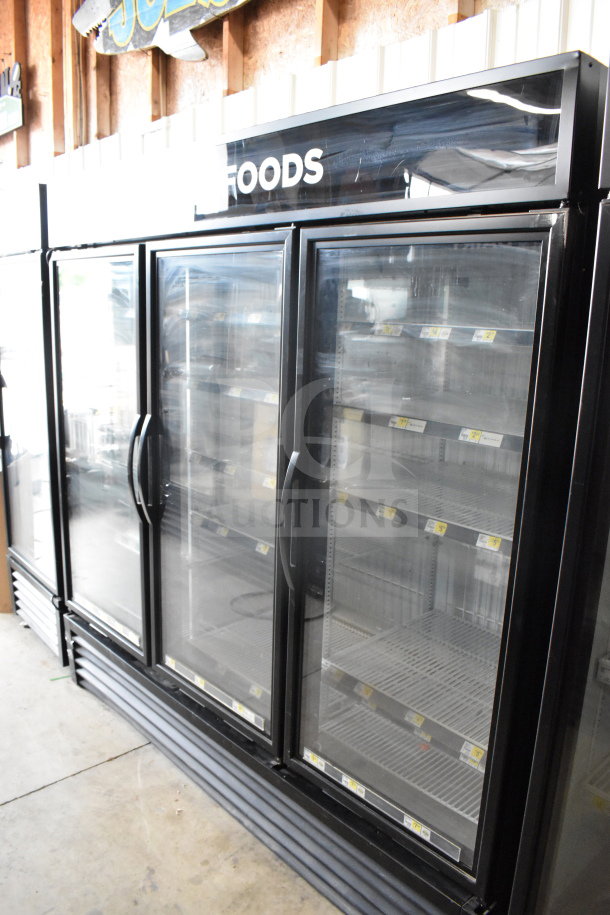 2017 True GDM-72F-HC commercial 3-door reach-in freezer merchandiser. Tested, working, 115/208-230V, 1 phase.