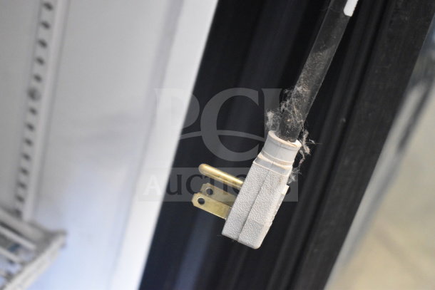 Close-up of electrical plug with dust, part of 2017 True GDM-49-HC commercial cooler. 115 Volts, tested and working.
