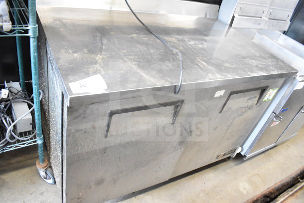 True TWT-48 Commercial 2 Door Work Top Cooler, stainless steel, 115 volts, 1 phase, visible wear, label shows model.