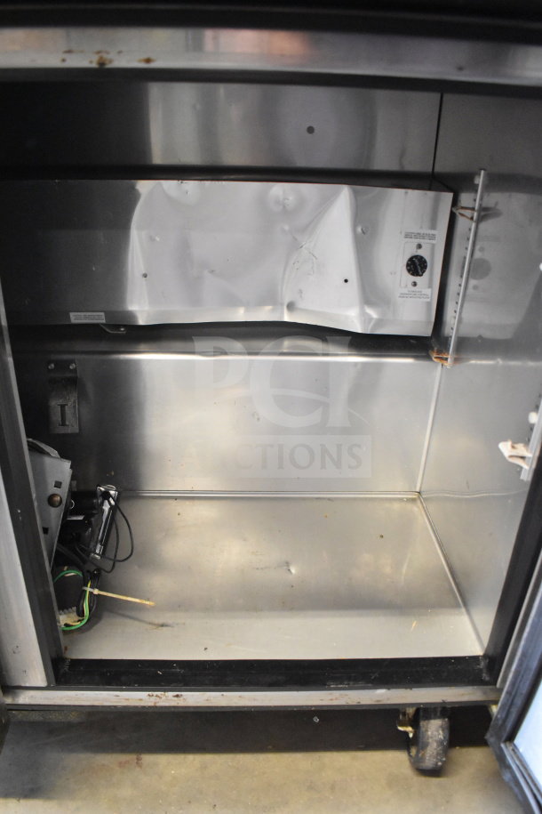 True TWT-48 Commercial 2 Door Work Top Cooler, stainless interior, 115 volts, 1 phase, minor wear, model label visible.