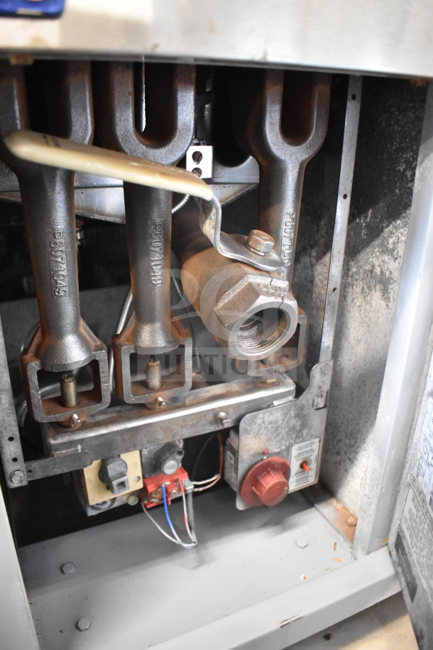 2016 Pitco Frialator 35C natural gas deep fryer, 90,000 BTU, showing heating elements and control valves, fair condition.