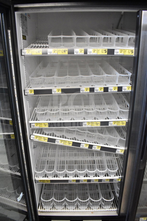 2017 True GDM-49-HC 3 Door Cooler Merchandiser, 115 Volts, 1 Phase, tested and working, with clear shelves and price tags.